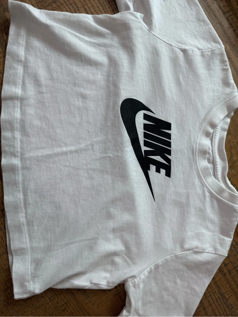 Nike White Short-Sleeve Tee with Black Swoosh Logo